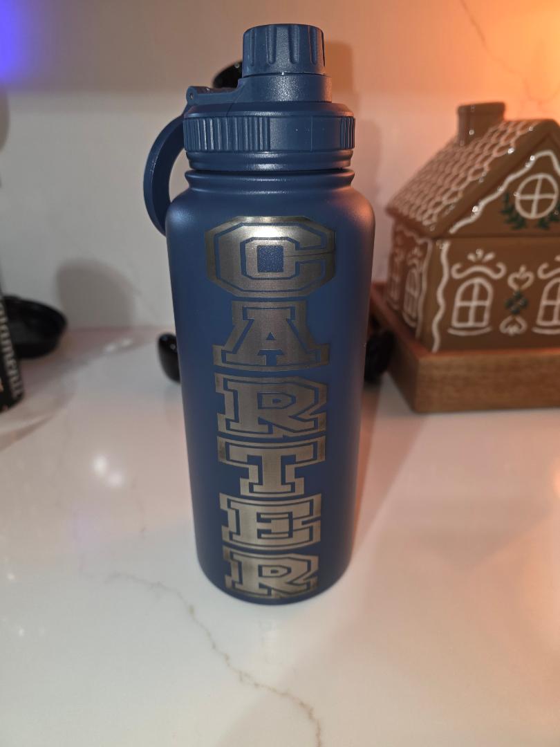 32 0Z SPORTS BOTTLE WITH MAGNETIC PHONE HOLDER LID